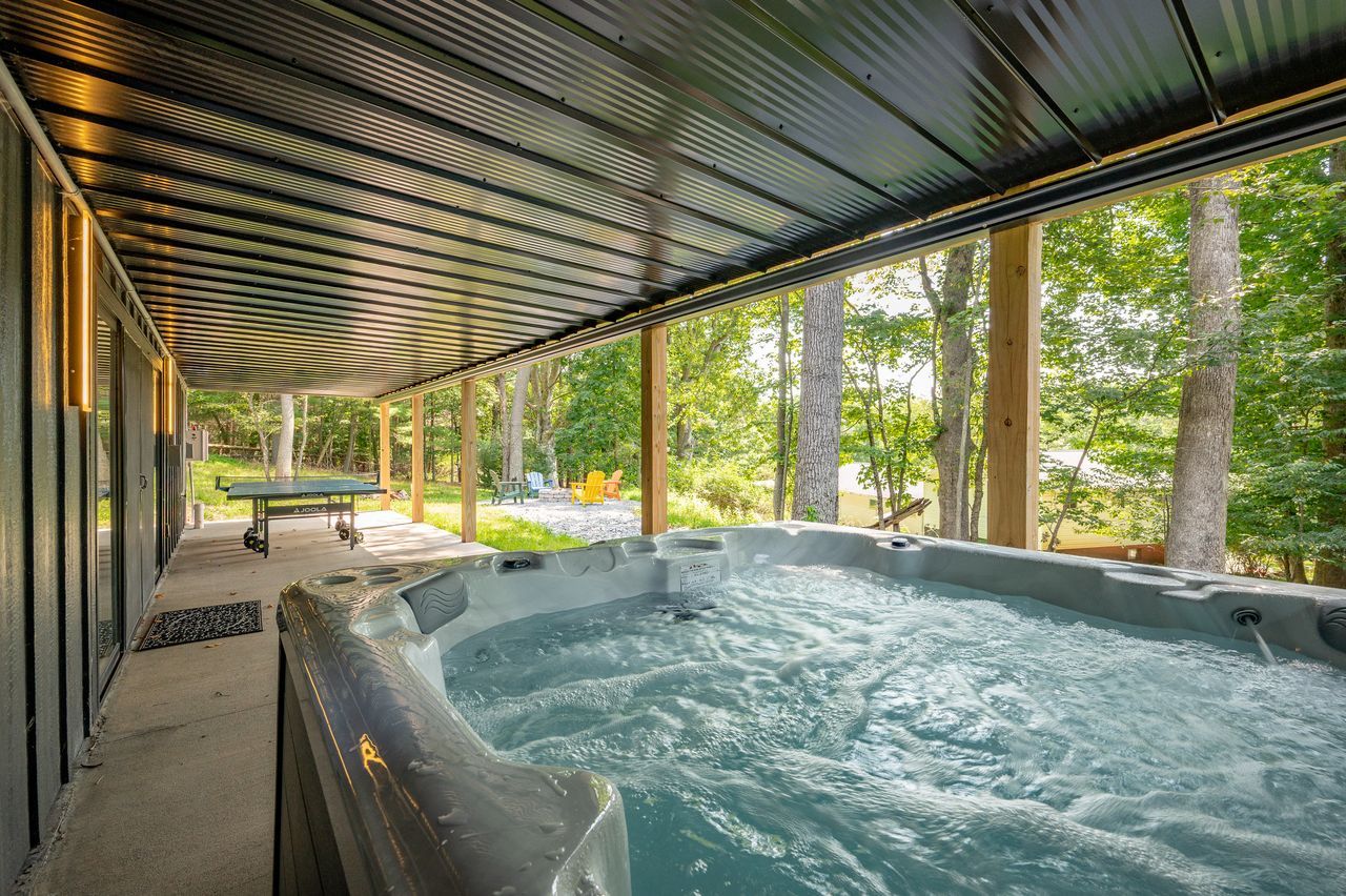 Herrington — covered hot tub beside the woods