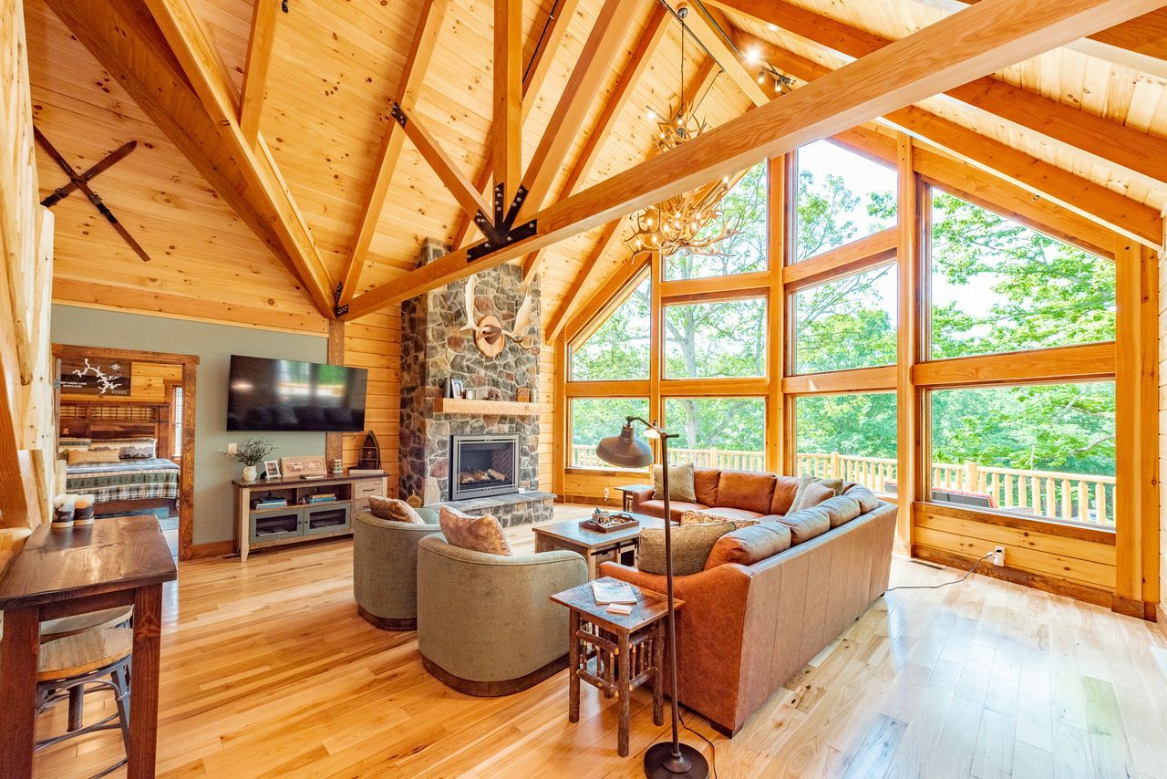 Great room with a cedar ceiling and window wall