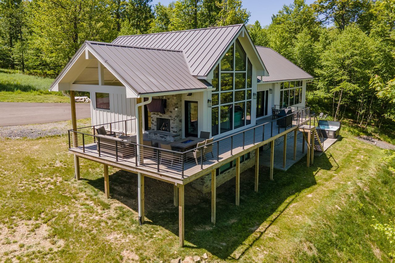 Greenbrier — gabled glass and a wraparound deck