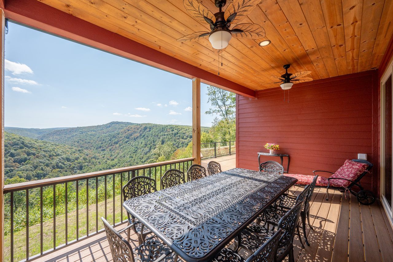 Ligonier — covered deck dining with mountain views