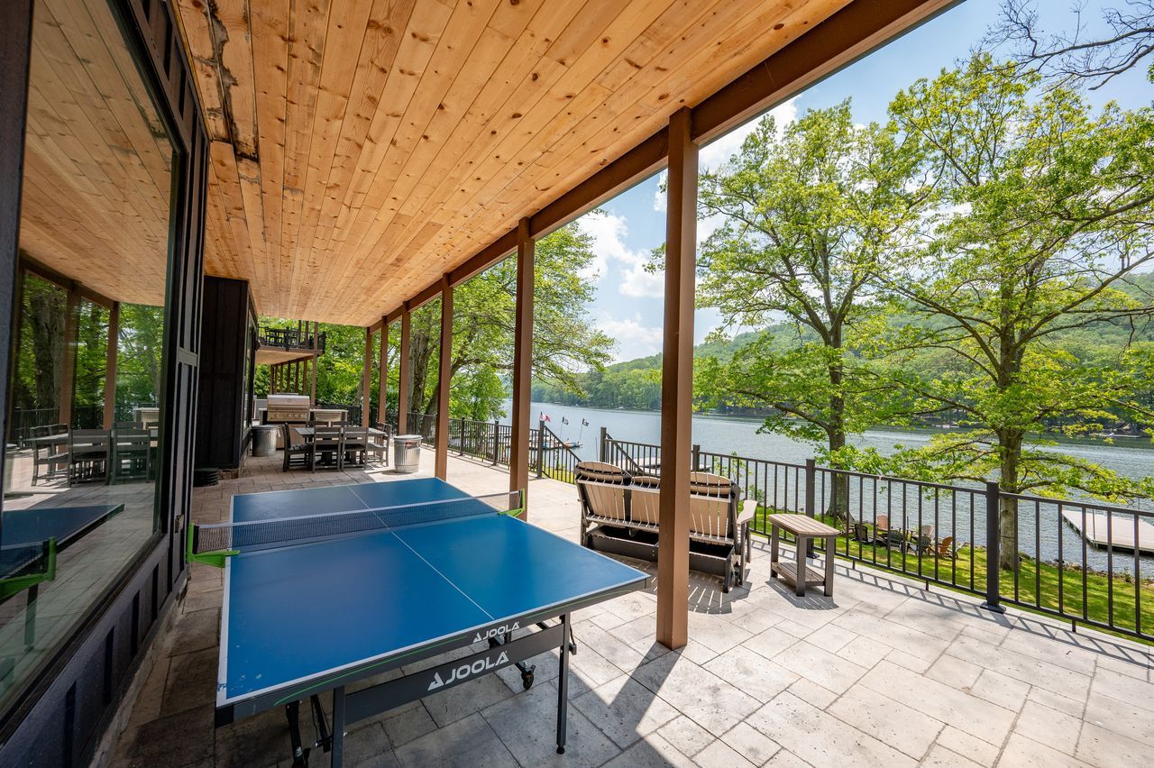 Water's Edge — covered patio and game area