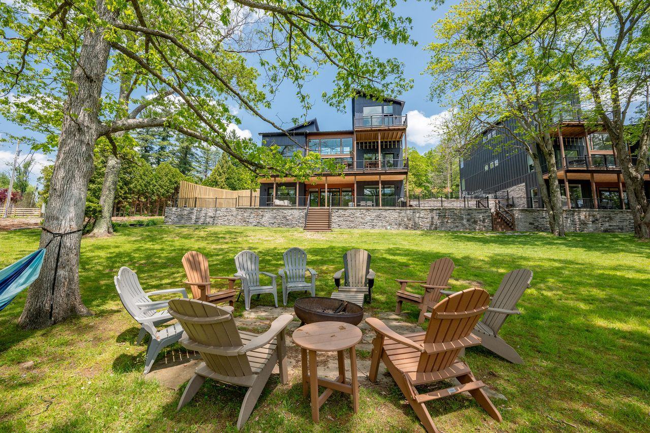 Water's Edge — lakeside lawn and fire pit