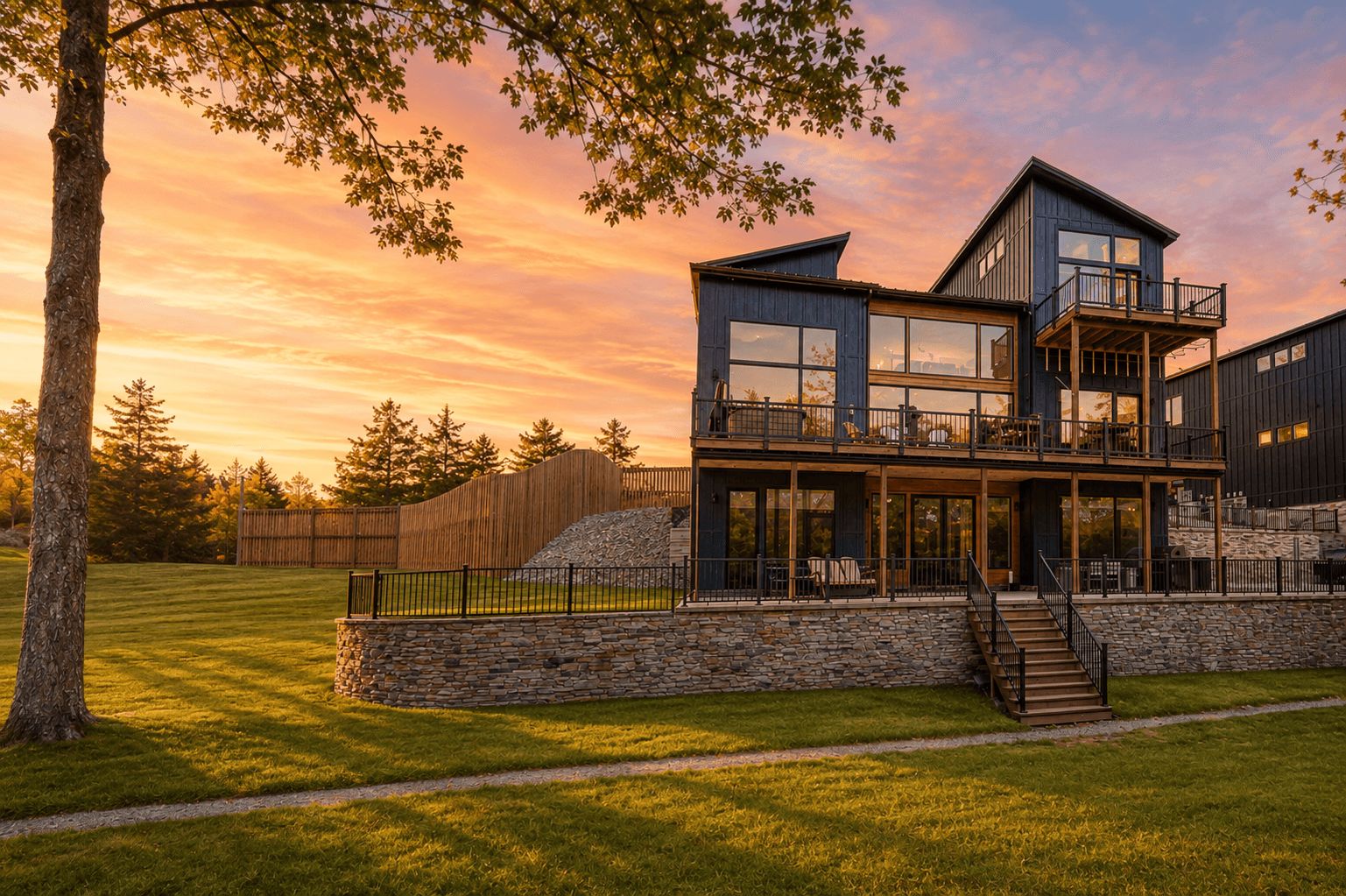 Water's Edge — evening light on the lake-side elevation